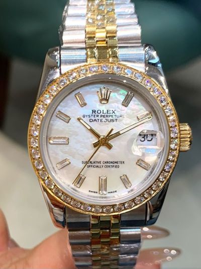 Rolex Datejust 31mm Baguette Diamond Bezel Two-tone Gold Band White MOP Face Lady Watch